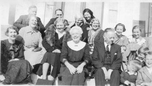 A laughing Lizzie George Henderson, middle front row, on the steps of her father's home, Cotesworth. Pictures of Miss Lizzie smiling are very rare.